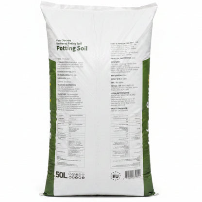 A 50L bag of potting soil shown from the back, featuring detailed product information, usage guidelines, and specifications printed in black text on a white bag with green side panels.